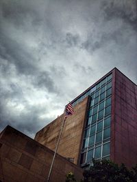 Low angle view of flag against sky