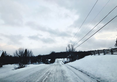 Road against sky during winter