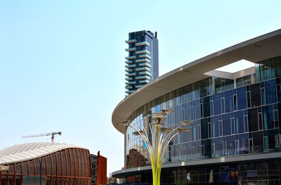 Low angle view of modern building against clear sky