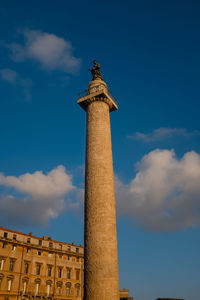 Low angle view of monument against blue sky