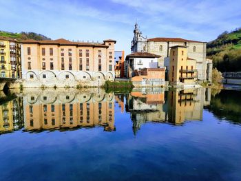 Reflection of buildings in lake