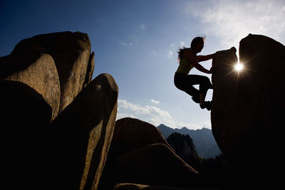 Female climber bouldering at seroksan national park in south korea