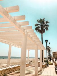 Built structure on beach against sky