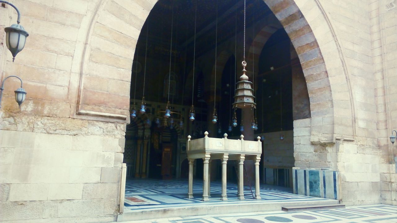 architecture, built structure, arch, indoors, building exterior, illuminated, lighting equipment, architectural column, corridor, building, the way forward, history, wall - building feature, archway, column, ceiling, old, in a row, brick wall, colonnade