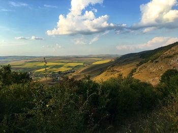 Scenic view of land against sky