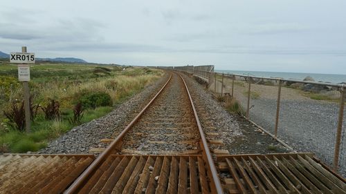 Railroad tracks against sky