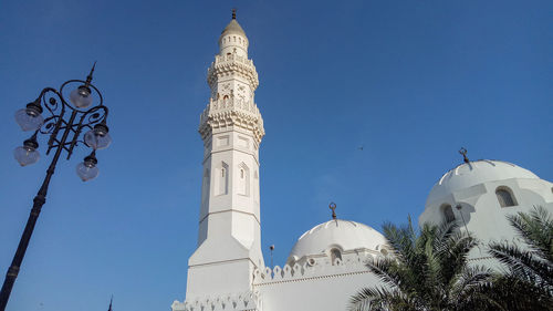 Low angle view of buildings against blue sky