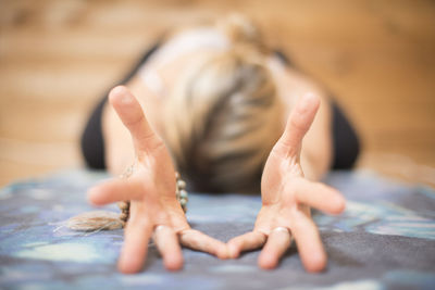 Close up of a girls hands during yoga.