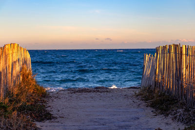 Scenic view of sea against sky during sunset