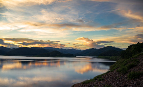 Scenic view of lake against sky during sunset