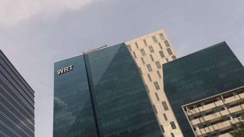 Low angle view of modern building against sky