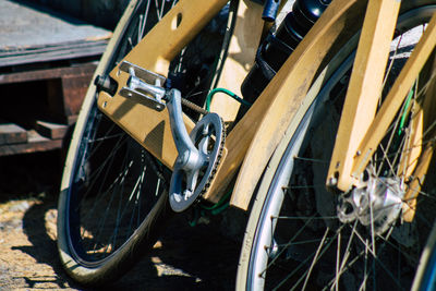 Close-up of bicycle parked on road