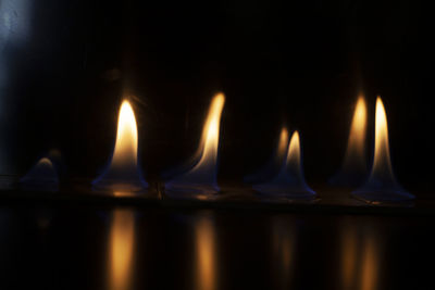 Close-up of burning candles