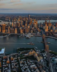 High angle view of city buildings by river