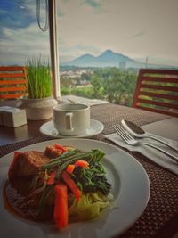 View of breakfast served on table