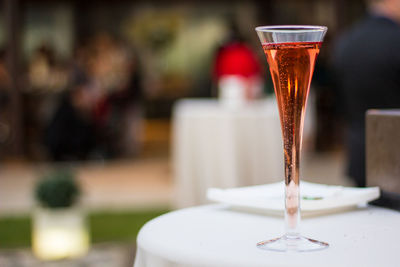 Close-up of wine in glass on table