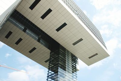 Low angle view of modern building against sky