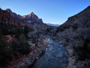 Scenic view of rocky mountains against clear sky