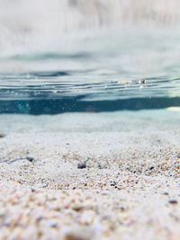 Close-up of stones on beach