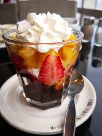 Close-up of dessert in glass on table