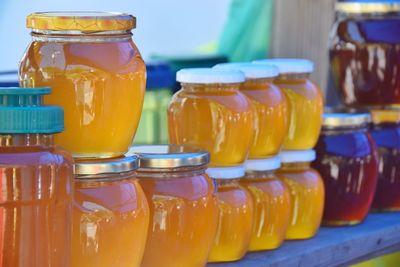 Honey in jars on table