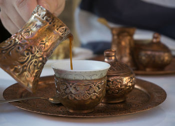 Close-up of coffee cup on table