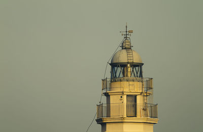 Low angle view of white lighthouse against clear sky