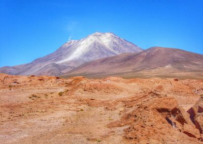 Scenic view of mountains against clear sky