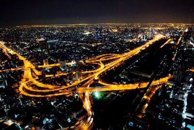 High angle view of illuminated cityscape