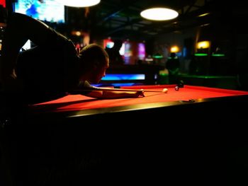 Man playing pool at club