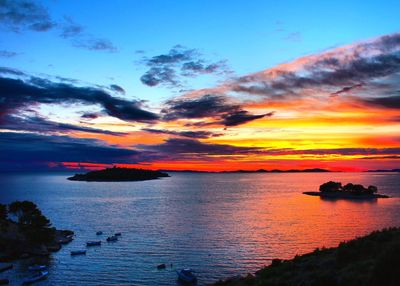 Scenic view of sea against dramatic sky