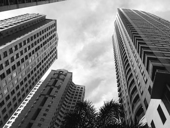 Low angle view of modern buildings against sky