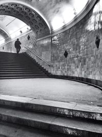 People walking in tunnel