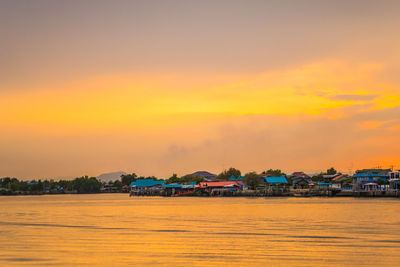 Scenic view of sea against romantic sky at sunset