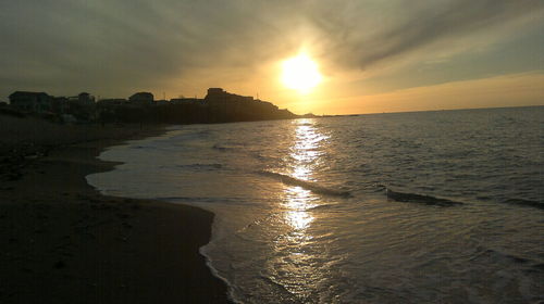 Scenic view of sea at sunset