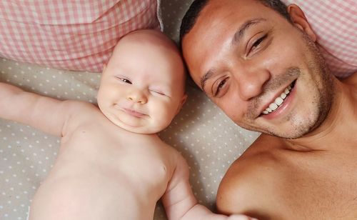 Portrait of shirtless baby girl