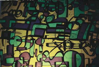 Full frame shot of colorful graffiti on wall