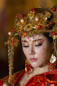 Portrait of woman with red berries