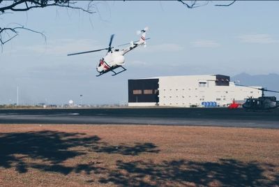 Cars on road against sky