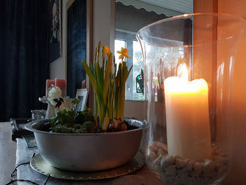 Close-up of candles on table at home
