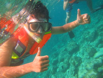 Man swimming in sea