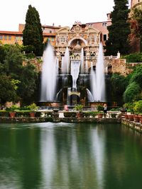 Scenic view of fountain against lake