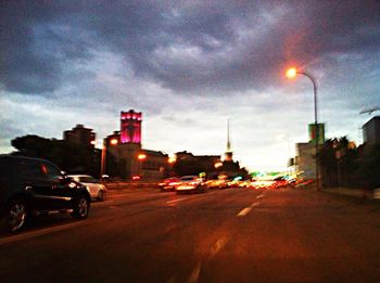 City street against cloudy sky