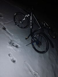 Bicycle on snow covered field