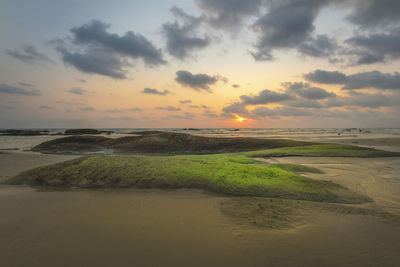 Scenic view of sea against sky during sunset