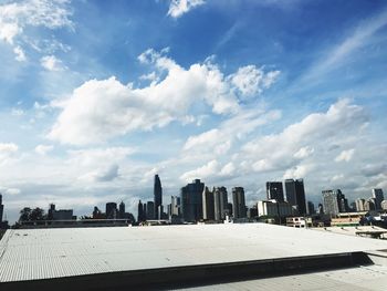 Modern buildings in city against sky