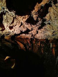 Close-up of rock formation in water