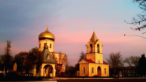 Cathedral of building against sky during sunset