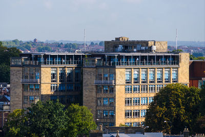 Buildings in city against sky