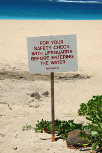 Warning sign on beach